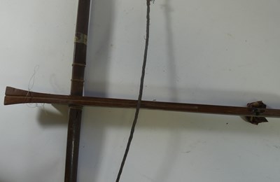 Lot 210 - A CAMBODIAN CROSSBOW AND A QUIVER OF ARROWS, 20TH CENTURY