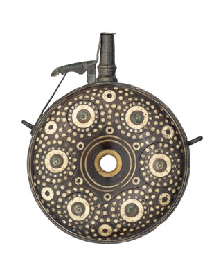 Lot 404 - A GERMAN CIRCULAR INLAID POWDER-FLASK, THIRD QUARTER OF THE 17TH CENTURY