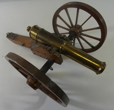 Lot 419 - A BRONZE MODEL NAVAL CANNON IN 18TH CENTURY STYLE