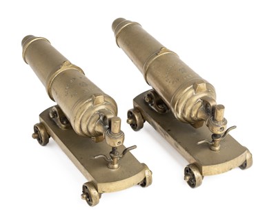 Lot 421 - A PAIR OF BRONZE MODEL CARRONADES, DATED 9TH OCT. 1918
