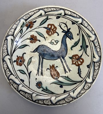 Lot 35 - AN IZNIK DISH, OTTOMAN ANATOLIA, MID-17TH CENTURY