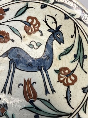 Lot 35 - AN IZNIK DISH, OTTOMAN ANATOLIA, MID-17TH CENTURY