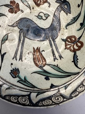 Lot 35 - AN IZNIK DISH, OTTOMAN ANATOLIA, MID-17TH CENTURY