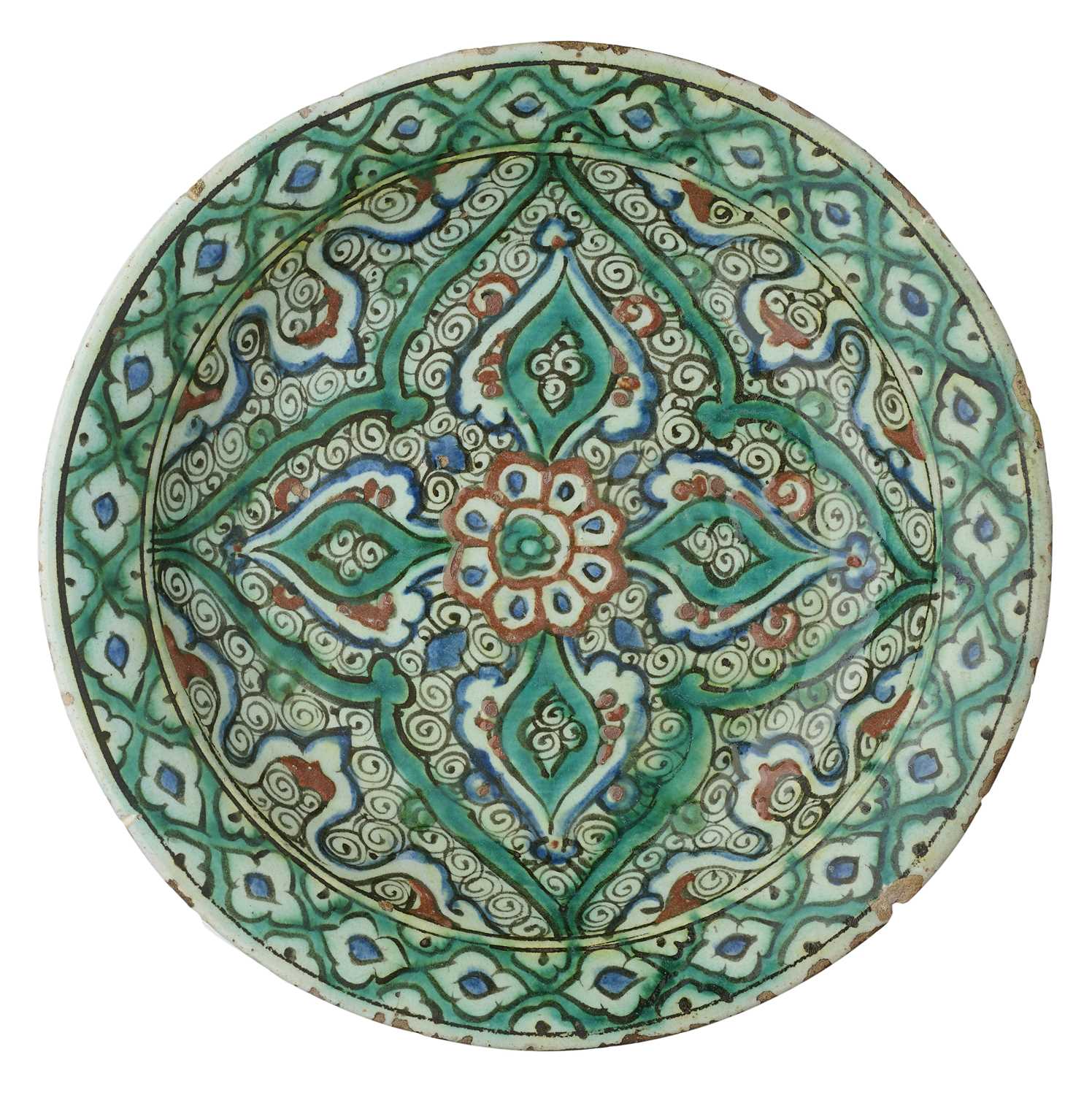 Lot 29 - AN IZNIK DISH, OTTOMAN ANATOLIA, CIRCA 1620-30