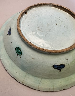 Lot 29 - AN IZNIK DISH, OTTOMAN ANATOLIA, CIRCA 1620-30