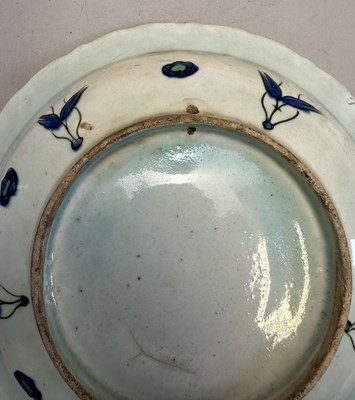 Lot 36 - AN IZNIK DISH, OTTOMAN ANATOLIA, CIRCA 1590-1600