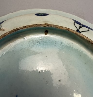 Lot 36 - AN IZNIK DISH, OTTOMAN ANATOLIA, CIRCA 1590-1600