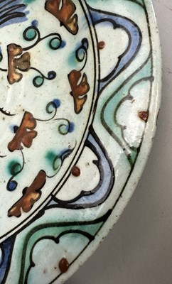 Lot 37 - AN IZNIK DISH, OTTOMAN ANATOLIA, MID-17TH CENTURY