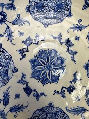 Lot 32 - AN IZNIK BLUE AND WHITE DISH, OTTOMAN ANATOLIA, CIRCA 1560-80