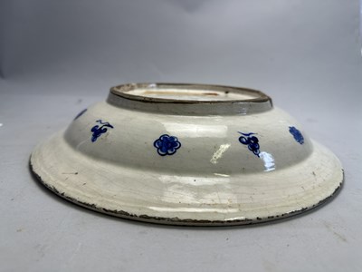 Lot 32 - AN IZNIK BLUE AND WHITE DISH, OTTOMAN ANATOLIA, CIRCA 1560-80