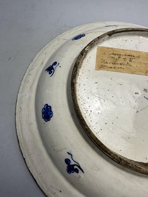 Lot 32 - AN IZNIK BLUE AND WHITE DISH, OTTOMAN ANATOLIA, CIRCA 1560-80