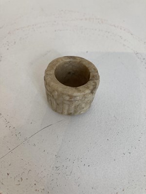 Lot 85 - A GROUP OF FOUR CHINESE CARVED JADE ARCHERS RINGS, QING DYNASTY, 19TH CENTURY
