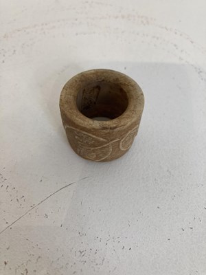 Lot 85 - A GROUP OF FOUR CHINESE CARVED JADE ARCHERS RINGS, QING DYNASTY, 19TH CENTURY