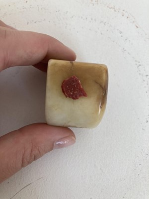 Lot 86 - A GROUP OF THREE CHINESE CARVED JADE ARCHERS RINGS, QING DYNASTY