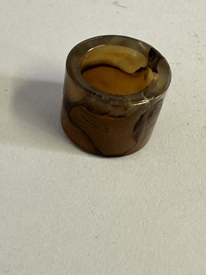 Lot 73 - TWO CHINESE CARVED AGATE ARCHERS RINGS, QING DYNASTY, 19TH CENTURY
