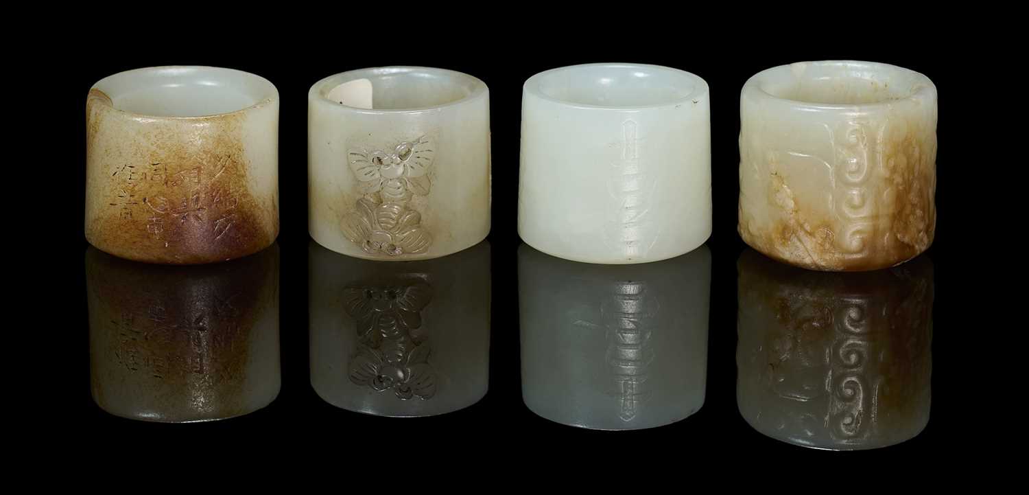Lot 79 - FOUR CHINESE CARVED JADE ARCHERS RINGS, QING DYNASTY, 18TH/19TH CENTURY