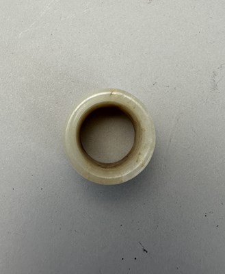 Lot 79 - FOUR CHINESE CARVED JADE ARCHERS RINGS, QING DYNASTY, 18TH/19TH CENTURY