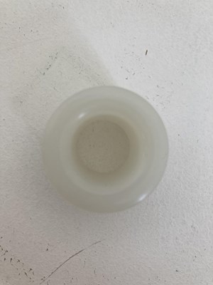 Lot 84 - A FINE CHINESE WHITE JADE ARCHERS RING, QING DYNASTY, 18TH CENTURY