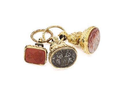 Lot 147 - THREE GEORGIAN GOLD-CASED SEALS, CIRCA 1820/30
