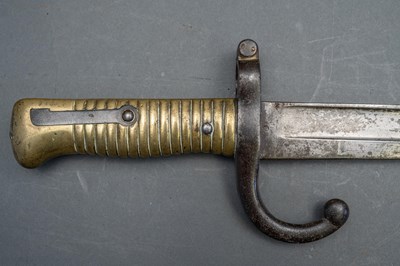 Lot 594 - A FRENCH MODEL 1866 CHASSEPOT BAYONET, DATED 1872, A LEATHER SHOT-FLASK, A TRIBAL HORN FLASK AND A COPPER ALLOY FLASK BODY, 19TH CENTURY