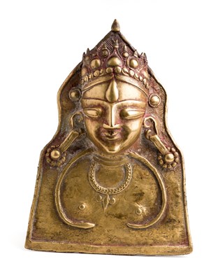 Lot 69 - A BRASS SIVA MASK (MOHRA), HIMACHAL PRADESH, 15TH CENTURY OR LATER