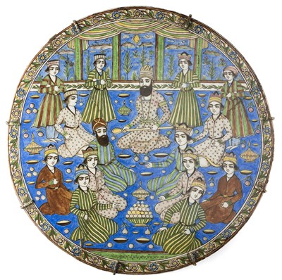 Lot 64 - A LARGE QAJAR CIRCULAR TILE, PERSIA, CIRCA 1880-1890