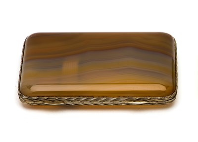 Lot 335 - A CONTINENTAL SILVER-GILT-MOUNTED AGATE CIGARETTE CASE, EARLY 20TH CENTURY