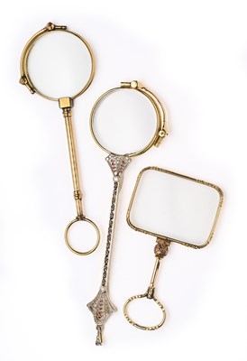 Lot 185 - □ A GOLD, RUBY AND DIAMOND LORGNETTE,  CIRCA 1910