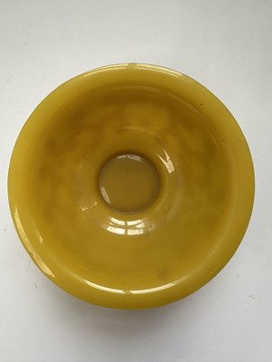 Lot 92 - A CHINESE EGG-YOLK YELLOW GLASS 'DRAGON' BOWL, QING DYNASTY, 19TH CENTURY