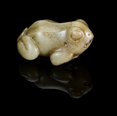 Lot 88 - A CHINESE CELADON JADE FROG, LATE MING DYNASTY
