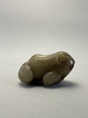 Lot 88 - A CHINESE CELADON JADE FROG, LATE MING DYNASTY