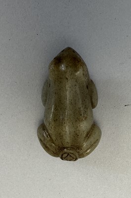 Lot 88 - A CHINESE CELADON JADE FROG, LATE MING DYNASTY