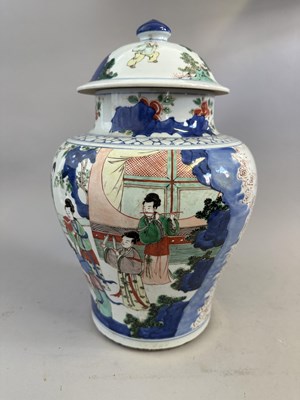 Lot 58 - A PAIR OF CHINESE TRANSITIONAL-STYLE WUCAI JARS AND COVERS