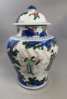 Lot 58 - A PAIR OF CHINESE TRANSITIONAL-STYLE WUCAI JARS AND COVERS