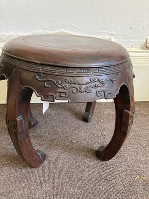 Lot 95 - A RARE SET OF FOUR CHINESE HUALI DRUM STOOLS, QING DYNASTY,  LATE 18TH/EARLY 19TH CENTURY