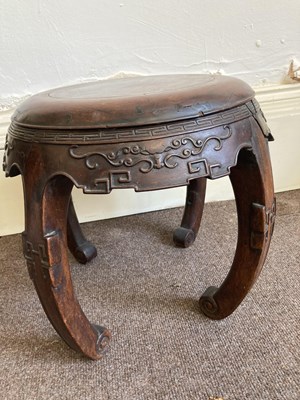 Lot 95 - A RARE SET OF FOUR CHINESE HUALI DRUM STOOLS, QING DYNASTY,  LATE 18TH/EARLY 19TH CENTURY