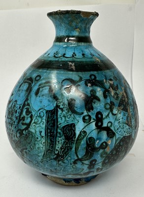 Lot 52 - A SELJUK BLACK PAINTED BOTTLE, KASHAN, PERSIA, 13TH CENTURY OR LATER