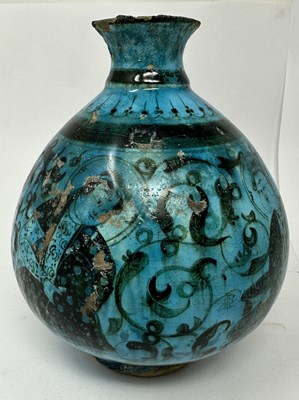 Lot 52 - A SELJUK BLACK PAINTED BOTTLE, KASHAN, PERSIA, 13TH CENTURY OR LATER