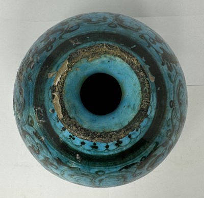 Lot 52 - A SELJUK BLACK PAINTED BOTTLE, KASHAN, PERSIA, 13TH CENTURY OR LATER