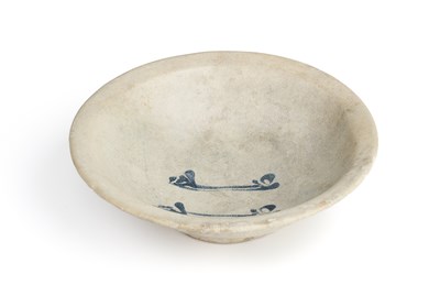 Lot 166 - AN ABBASID TIN GLAZED POTTERY BOWL, MESOPOTAMIA, CIRCA 9TH CENTURY