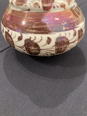 Lot 513 - A SAFAVID LUSTRE PAINTED POTTERY BOTTLE, PERSIA, 17TH CENTURY