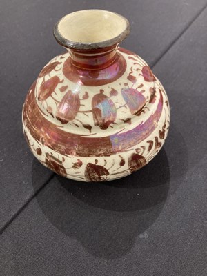 Lot 513 - A SAFAVID LUSTRE PAINTED POTTERY BOTTLE, PERSIA, 17TH CENTURY