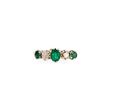 Lot 435 - EMERALD AND DIAMOND HALF HOOP RING