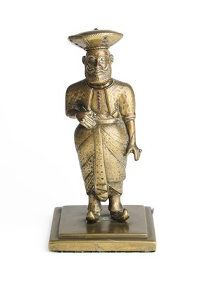 Lot 364 - A SINHALESE BRASS FIGURE OF A KANDYAN NOBLEMAN, NEGOMBO, SRI LANKA, EARLY 20TH CENTURY