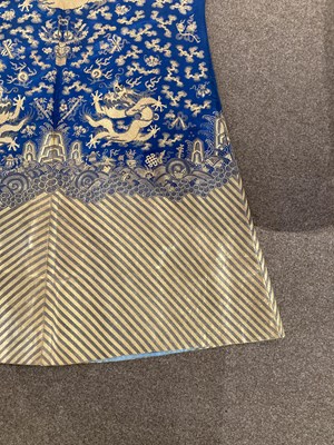 Lot 70 - A CHINESE EMBROIDERED SILK ‘NINE DRAGON’ ROBE, JIFU, LATE QING DYNASTY, CIRCA 1900