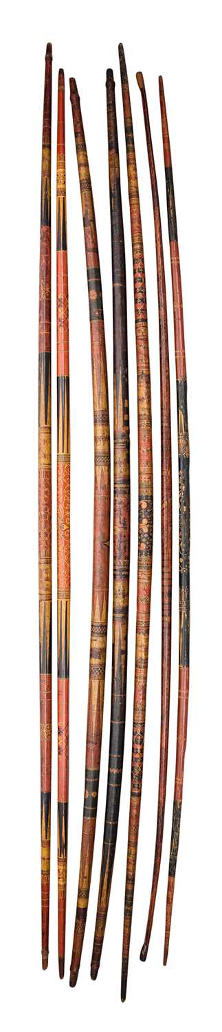 Lot 31 - SEVEN INDO-PERSIAN PAINTED SELF BOWS, 19TH CENTURY