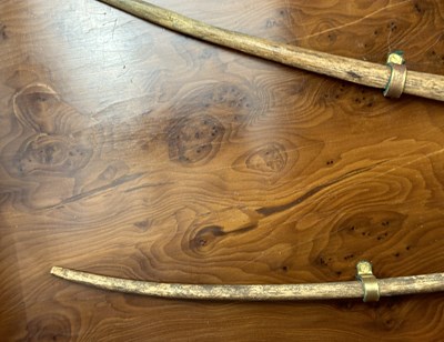 Lot 1 - TWO ANCIENT EGYPTIAN BOWS, PROBABLY MIDDLE KINGDOM CIRCA 2000 B.C., AND THREE STONE ARROWHEADS