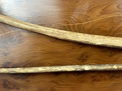 Lot 1 - TWO ANCIENT EGYPTIAN BOWS, PROBABLY MIDDLE KINGDOM CIRCA 2000 B.C., AND THREE STONE ARROWHEADS