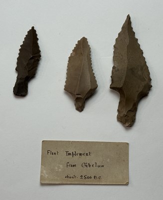 Lot 1 - TWO ANCIENT EGYPTIAN BOWS, PROBABLY MIDDLE KINGDOM CIRCA 2000 B.C., AND THREE STONE ARROWHEADS