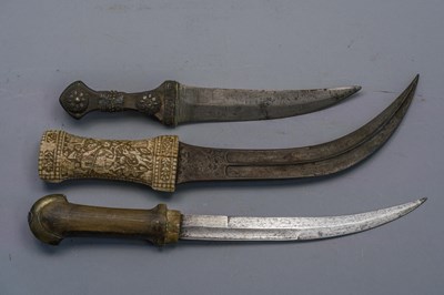 Lot 558 - A PERSIAN DAGGER (JAMBIYA) AND TWO FURTHER DAGGERS (JAMBIYA), LATE 19TH/20TH CENTURY